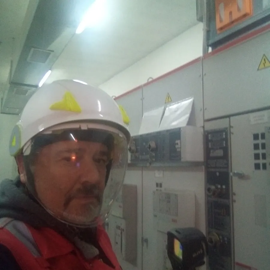 Pegasus Services operator at work in an electrical substation room