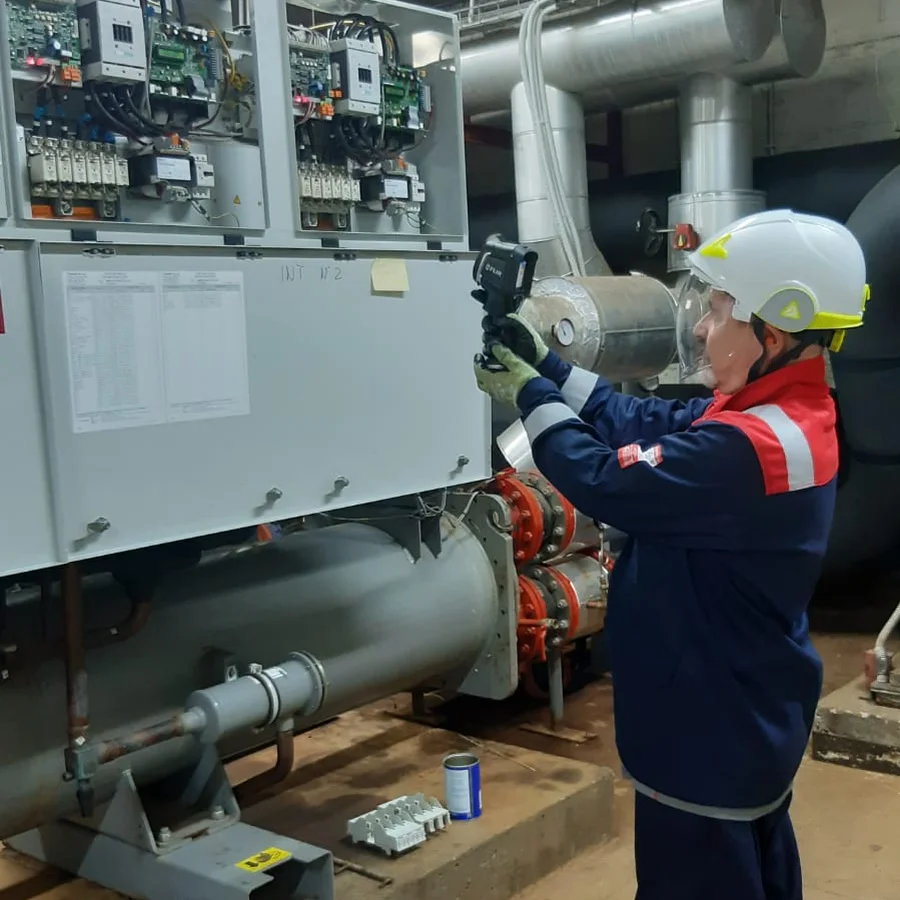 Pegasus technician during a thermographic inspection of an electrical panel